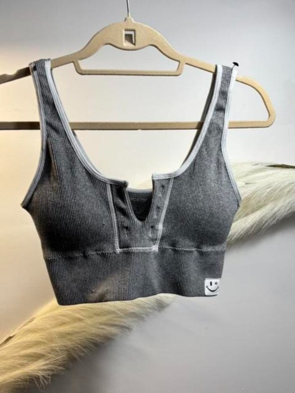 (#32) Grey ribbed sports bra with white trim and button detail